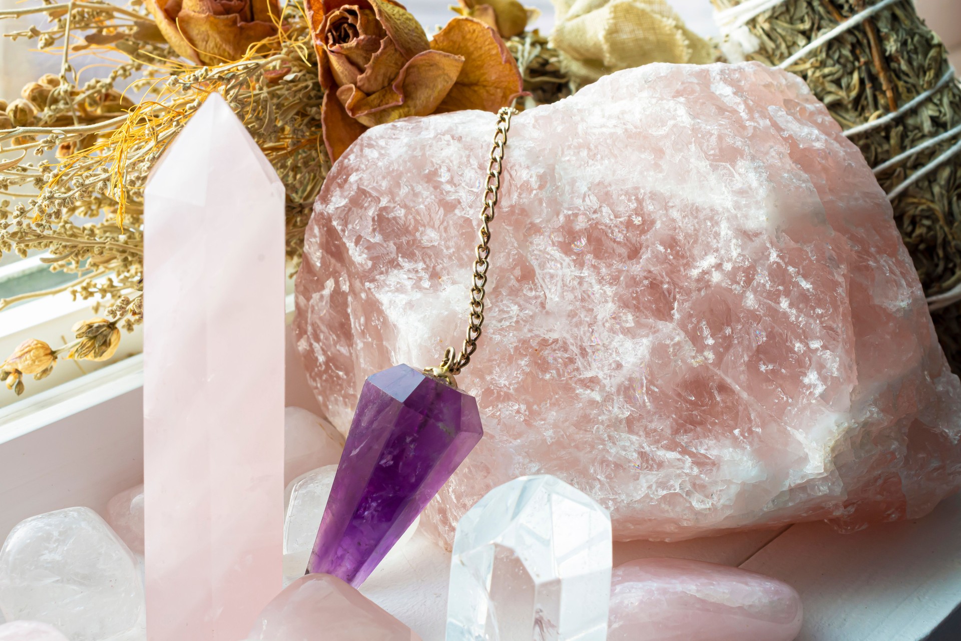 Rose Quartz Crystals and Pendulum